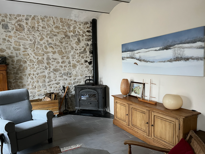 Canapé 3 places et poêle à bois